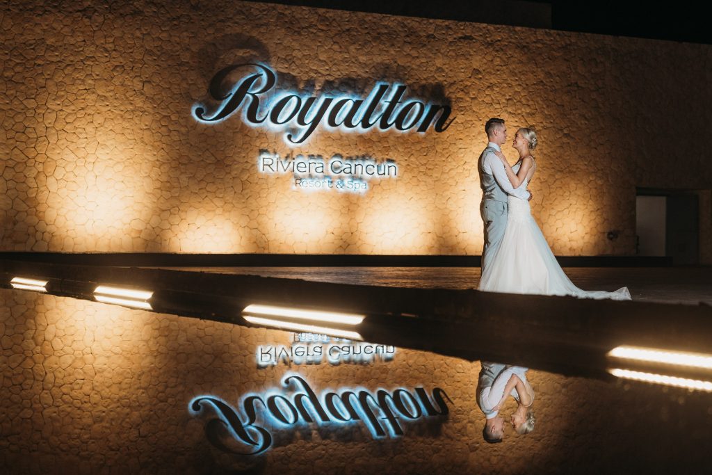 Royalton Riviera wedding photos - Final photo outside with the Royalton Riviera sign in the background